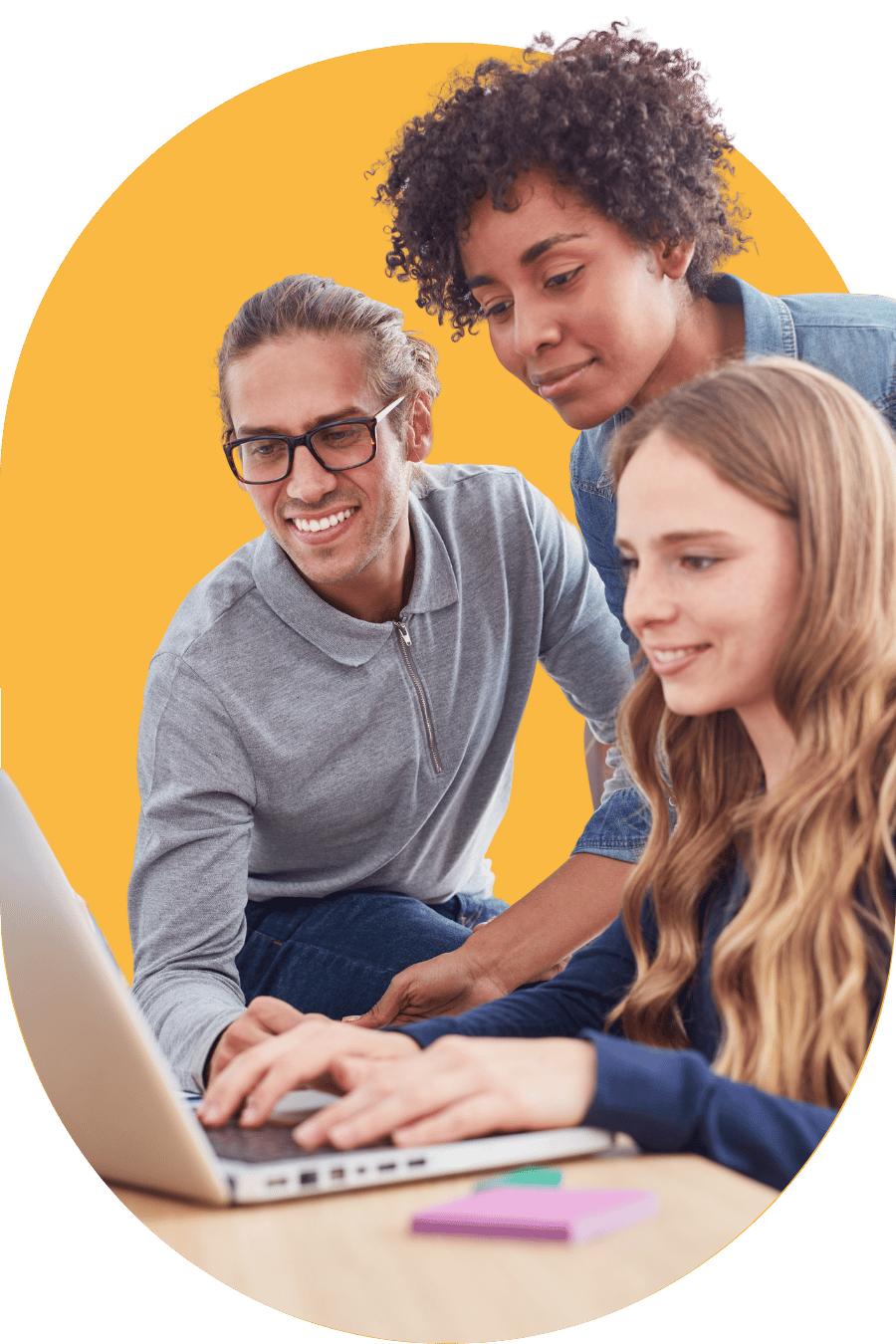 People looking at a computer